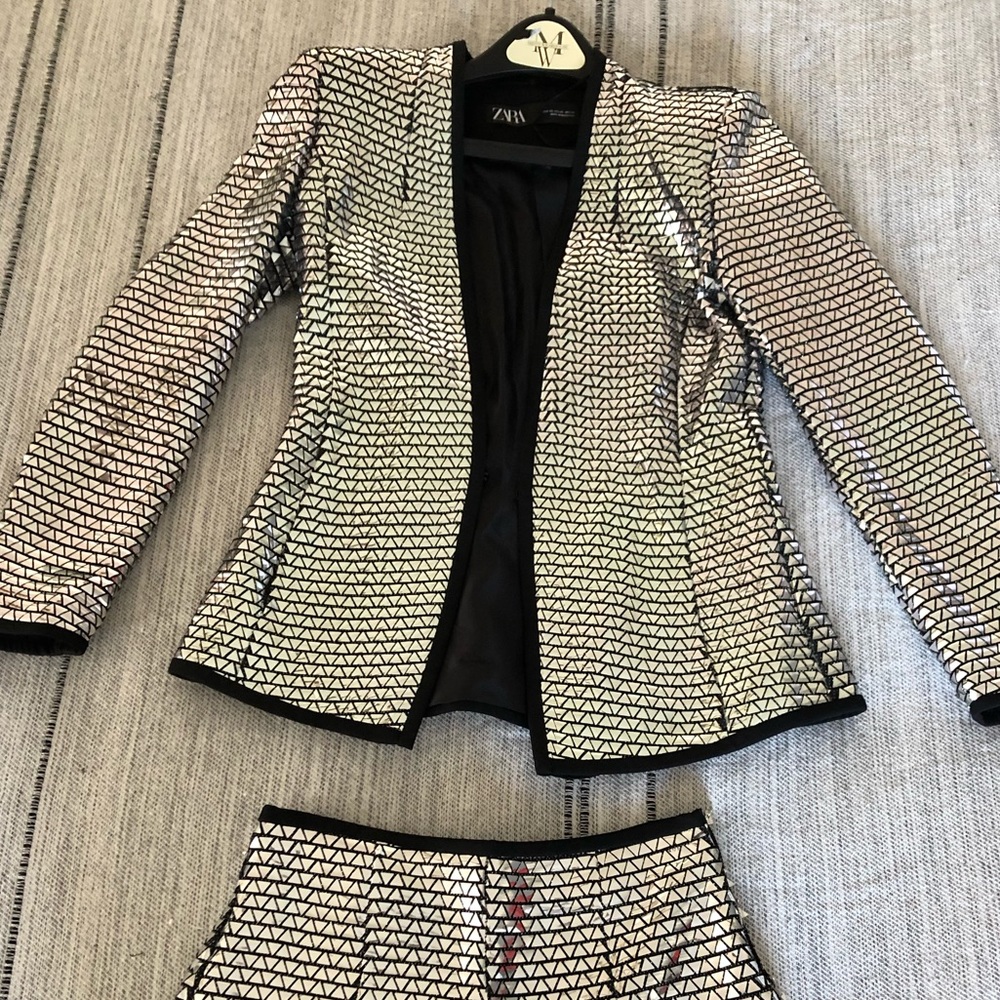 Silver shorts, with a matching blazer